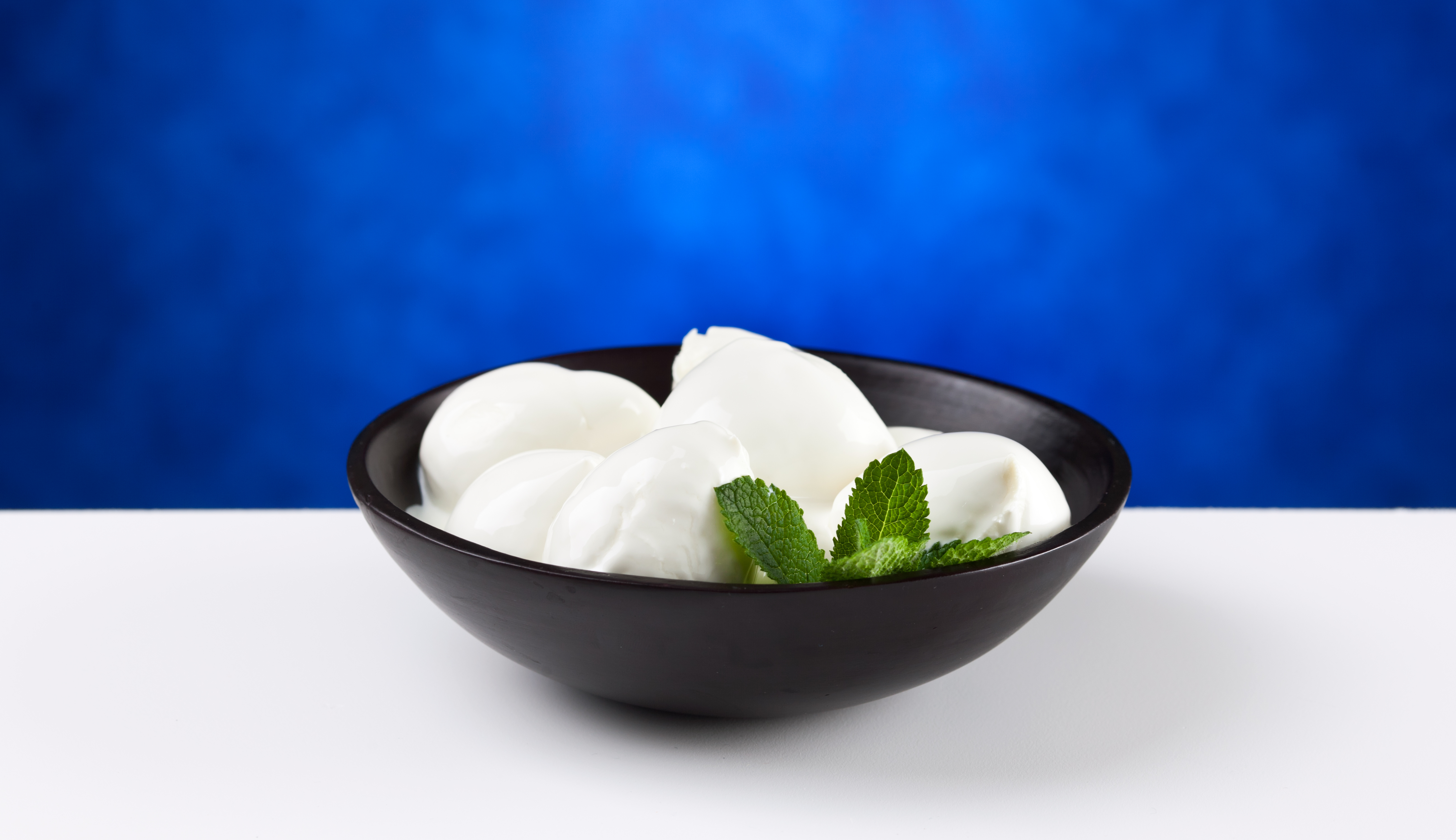 Fresh cultured cheese in a bowl